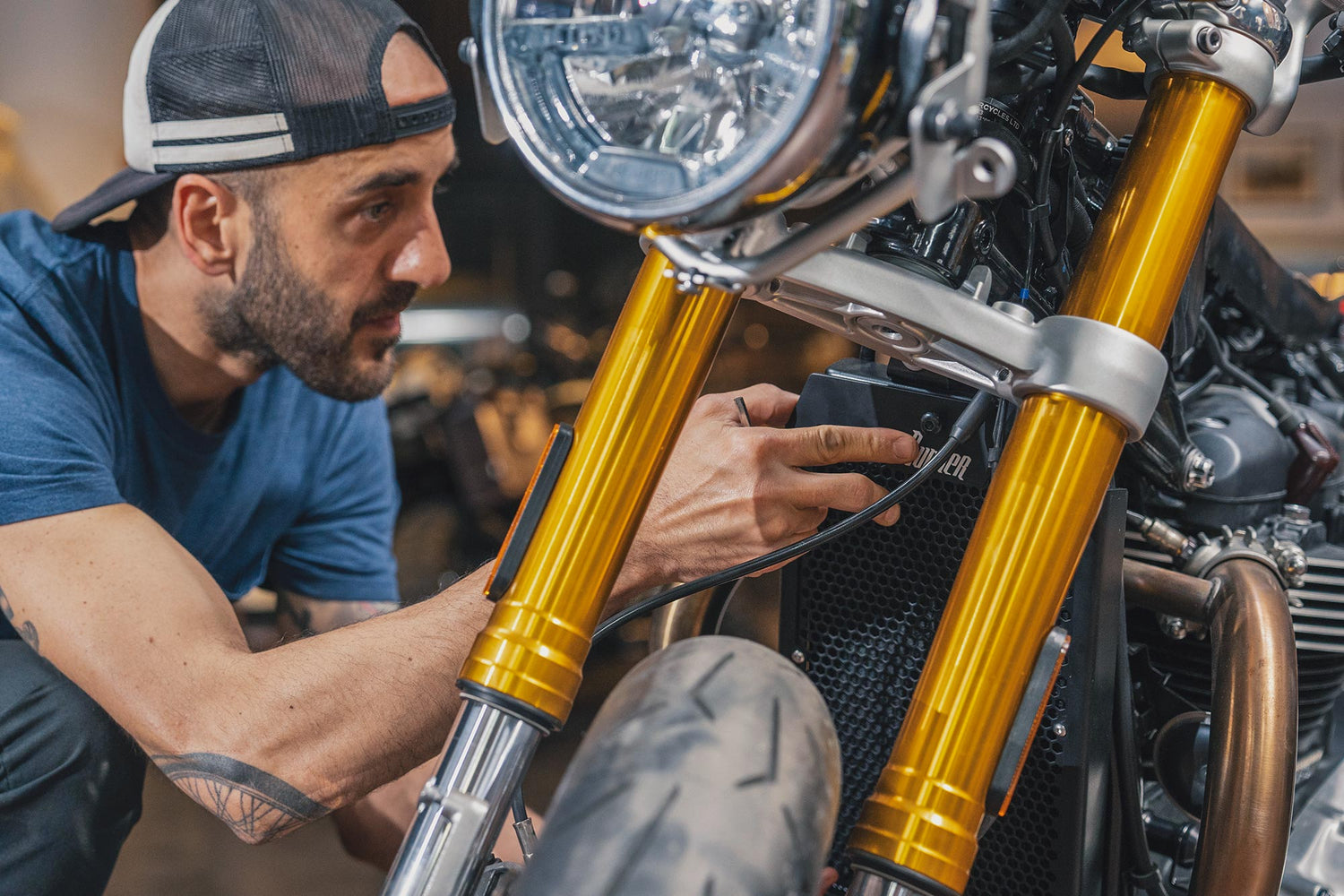 Triumph radiator guard installation