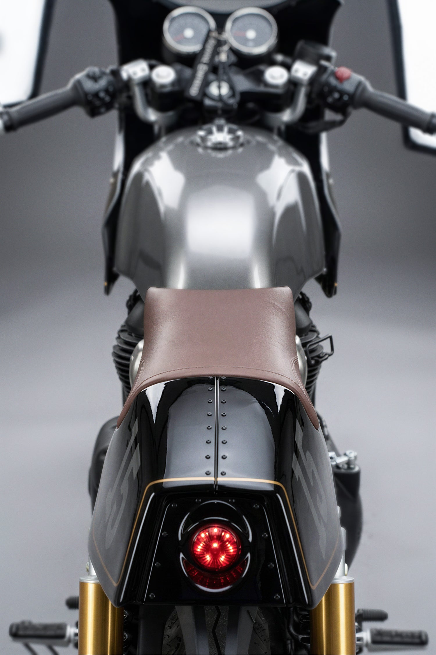 Black Royal Enfield GT 650 with gold accents Cafe racer Front Fairing kit with mono seat Tail Cowl number 15 Tail View