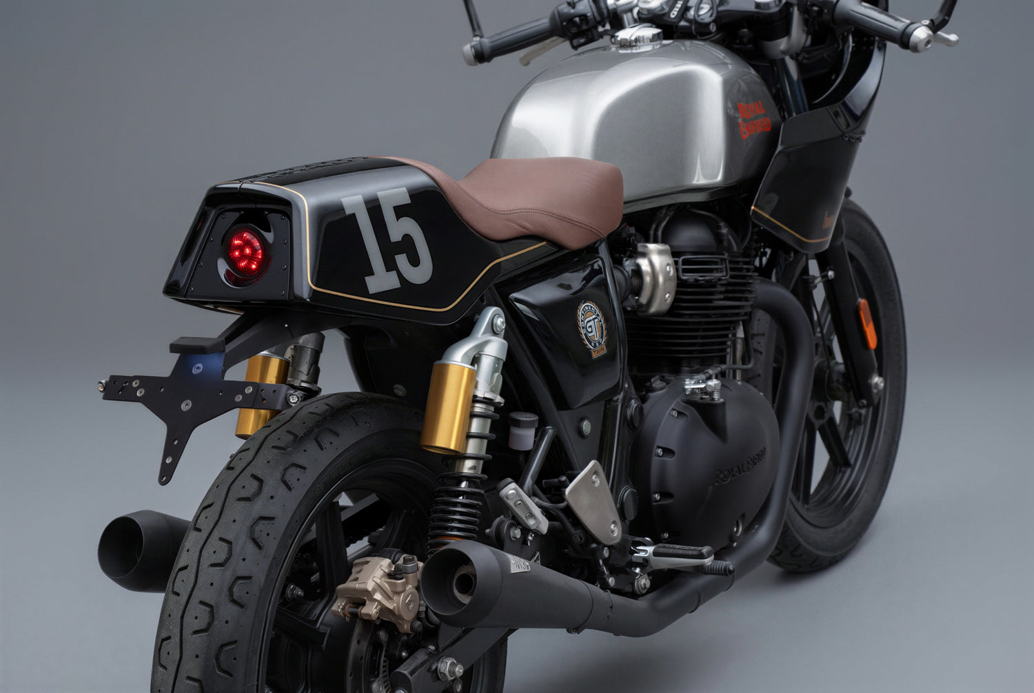 Black Royal Enfield with gold accents Mono Seat tail tidy Retro Stop light
