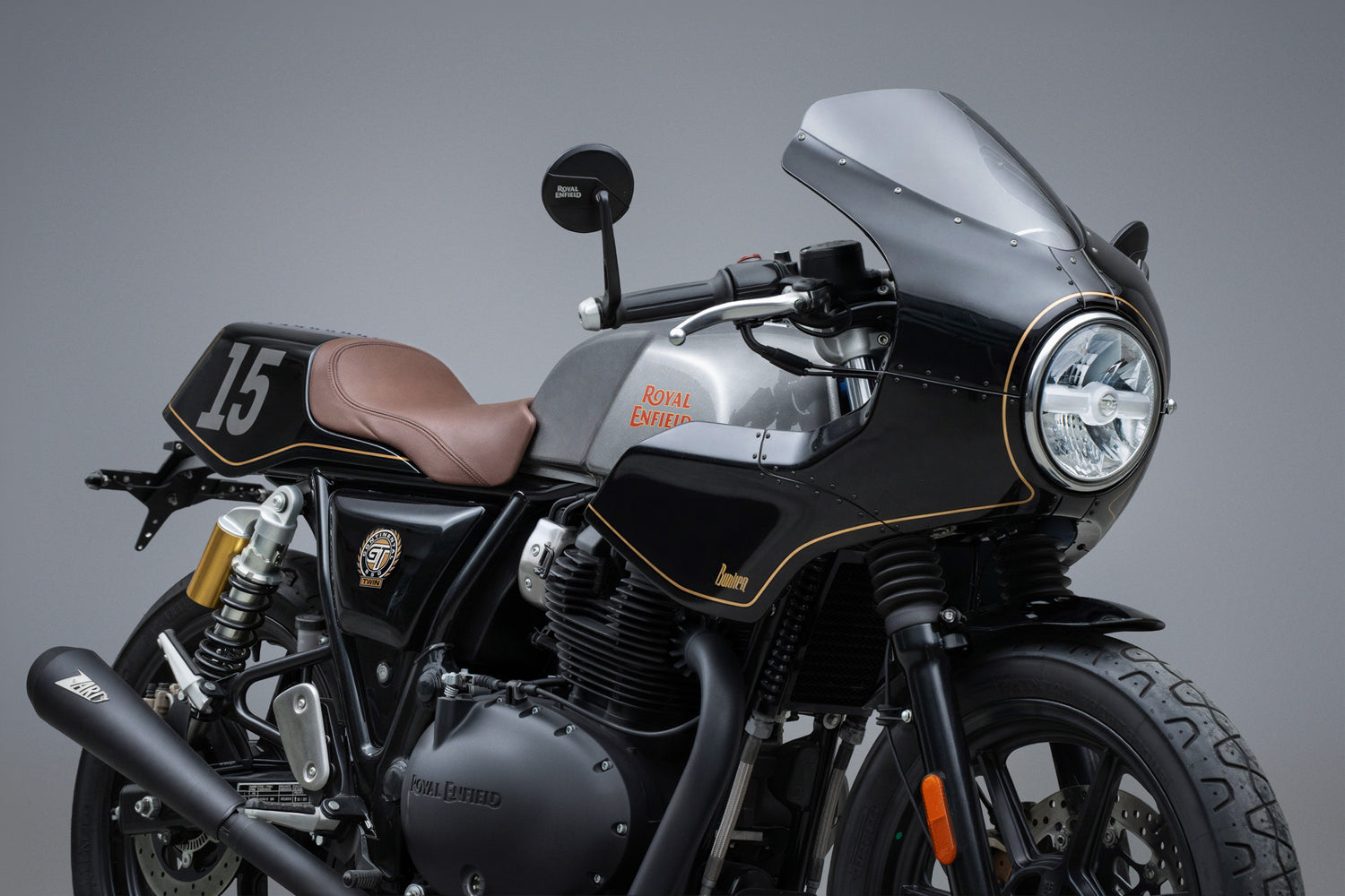 Black Royal Enfield GT 650 with gold accents Cafe racer Front Fairing kit with mono seat Tail Cowl number 15 Front quarter view